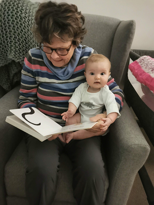 Image: A grandmother and grandchild reading together. Image: A grandmother and grandchild reading together.